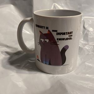 Curiosity is more important than knowledge ceramic Cat mug. 11 ounce. New